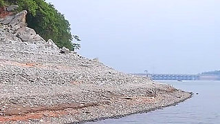 Couple Enjoy in River and Mountain