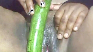 Today, Indian Bhabhi Quenched Her Desire by Inserting a Cucumber Into Her Pussy