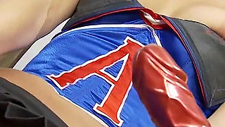 Cheerleader hottie shoves a fuck toy in her tight cunt