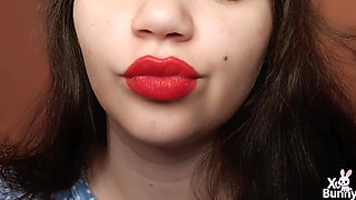 Big red lips smoking close up