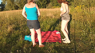 Beauties Sunbathing on the Beach