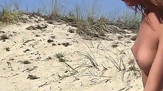 Lovely 18 Year Brunette Sunbathes Naked on the Beach