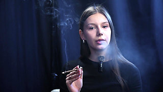 Young Girl Smoking Solo in a Calm Studio Session with Slow Exhales