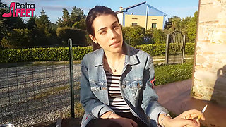 Petra smokes her ciggaretes outdoor