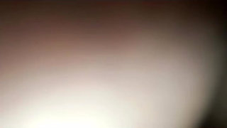 Husband and wife have a fun video in the bedroom.