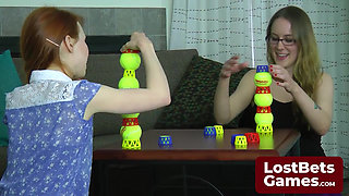 Two lesbians in an intimate Strip Ball Stacks challenge