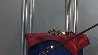 Mistress Whips Male Masochist Who Is Holding Dildo in His Mouth to Prevent It From Falling Out of Female Masochist Pussy