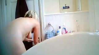 Blonde curvy stepmom peeped at in bathroom