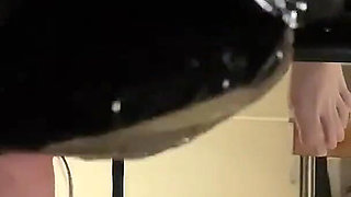 Close up Ruined Multiple Times Into a Glass on the Milking Table