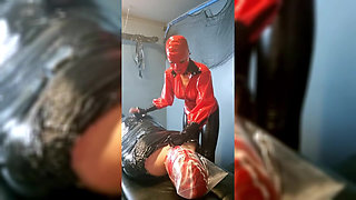 Extreme Breathplay on Mummified Slave in Latex