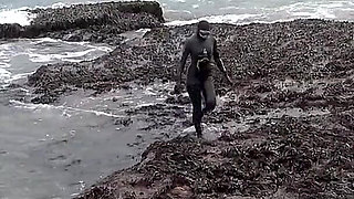 Rubbery Beach Encounter: Lucy's Neoprene Pussy Play with Stranger