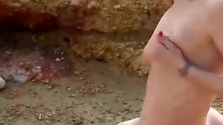 Horny couple fucks on the beach