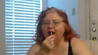 Mature BBW Redhead Nurse Vicki Talks to You as She Makes a Lipstick Applying Video for You!