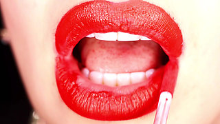 4K Applying red lipstick and smoking hookah on black background