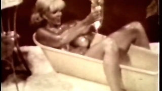 Sweet Blonde Candy Samples Oils Herself up in the Bathroom