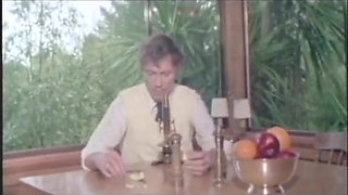 A sweet bitch has some trouble to eat John Holmes's huge cock