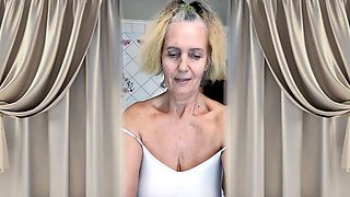 Cheerful housewife Lukerya flirts with admirers in the kitchen