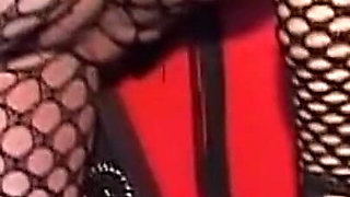 Dominant MILF Teases Her Hooded Submissive with Toys