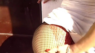 Fishnet Brunette Rides Hard Cock in Bedroom