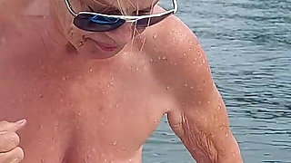 Sexy Granny Swims Naked in a Lake!