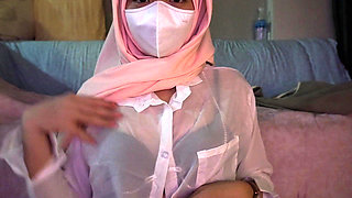A Cute Petite Hijabi Doing Porn