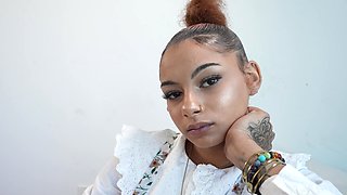 Sultry Dora Belle indulges in a raw and raunchy interracial romp on her soft sheets