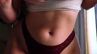 Brunette seductress working her big boobs and hot ass