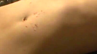 Petit girl stretching, candle dripping