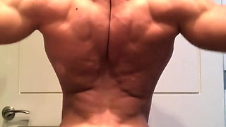 Jacked Bodybuilder Benji Bastian Flexing His Huge, Shredded, Muscles