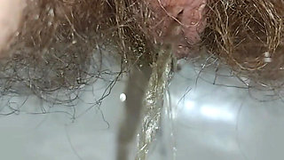 I'm Taking Close-ups of Myself Peeing in the Toilet