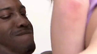 Cute redhead chick fucked by a BBC dude on the couch