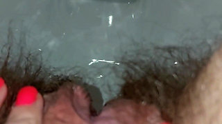 Pissing Woman in the Toilet