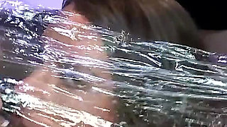 Slutty Brunette in Green Gets Massive Facial Bukkake