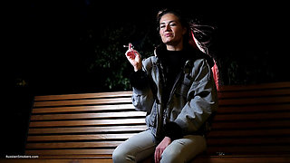 Sexy Russian Beauty Smoking Cigarette by Seaside