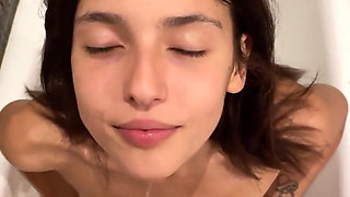Gigantic piss on the body of a slim teen
