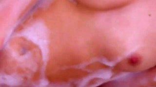 Hot blonde Daniella Margot fucks herself with a finger in the bath