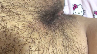 Hot mom massages her giant hairy pussy