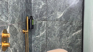 Latex Cow Undressing Under the Shower