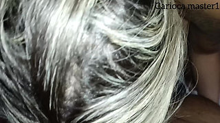 Married Woman Swallowing Milk From the Fountain and Smiling